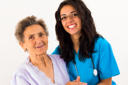 Caregiver and Elderly smiling